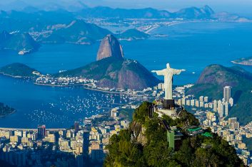 Rio de Janeiro, Brazil - June 6th, 2013: Aerial view from a helicopter of the city of Rio de Janeiro with the Corcovado mountain and the statue of Christ the Redeemer with Sugarloaf mountain in the background.